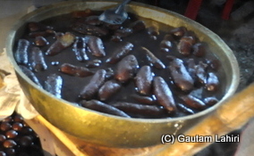 The hot boiling 'Langcha' in its sugary swamp towards Santiniketan, West Bengal, India by Gautam Lahiri