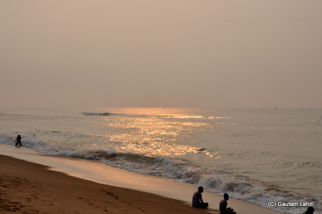 Sun shimmering over the sea all the way to the horizon  at Puri, Bhubaneshwar, Odisha, India by Gautam Lahiri
