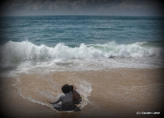 Bi-directional waves of water created a temporary wall of white sea water before breaking off to form another wave  at Puri, Bhubaneshwar, Odisha, India by Gautam Lahiri