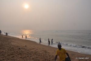 The 'Nulias' get busy when more bathers pour in and sun starts shinning more  at Puri, Bhubaneshwar, Odisha, India by Gautam Lahiri