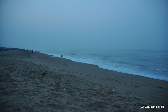 The cool sand, the cold sea gave no clue of what happens during the day  at Puri, Bhubaneshwar, Odisha, India by Gautam Lahiri