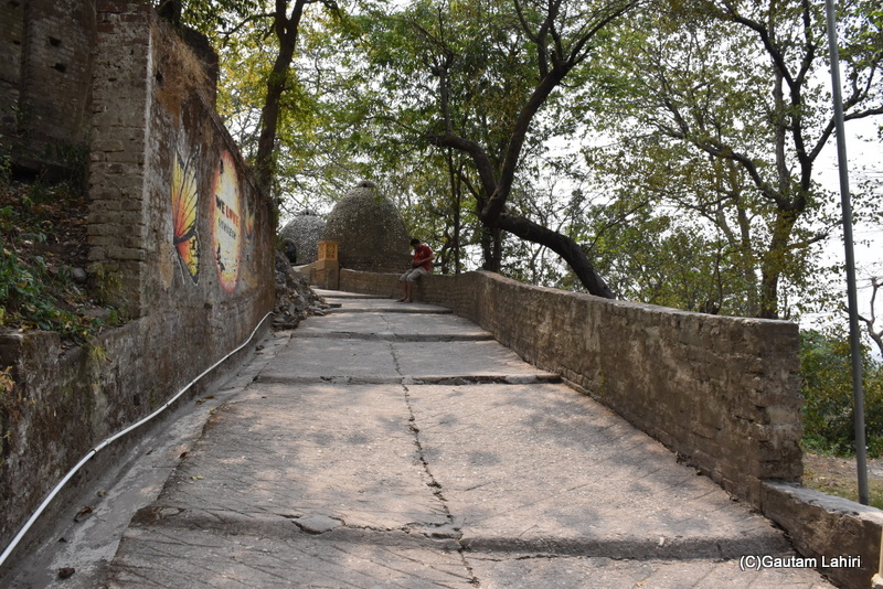 The stone bordered road that went up to the meditation domes by gautam lahiri