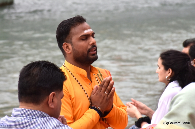 A senior monk, at parmarth niketan ghat, chanting hymns, Rishikesh by gautam lahiri