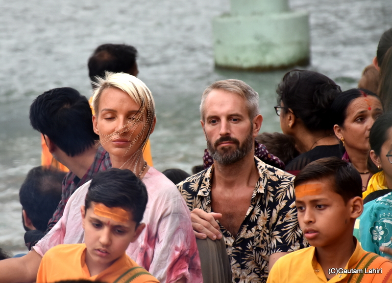 A foreign couple is completely captivated by Aarti's beautiful songs, Rishikesh by gautam lahiri
