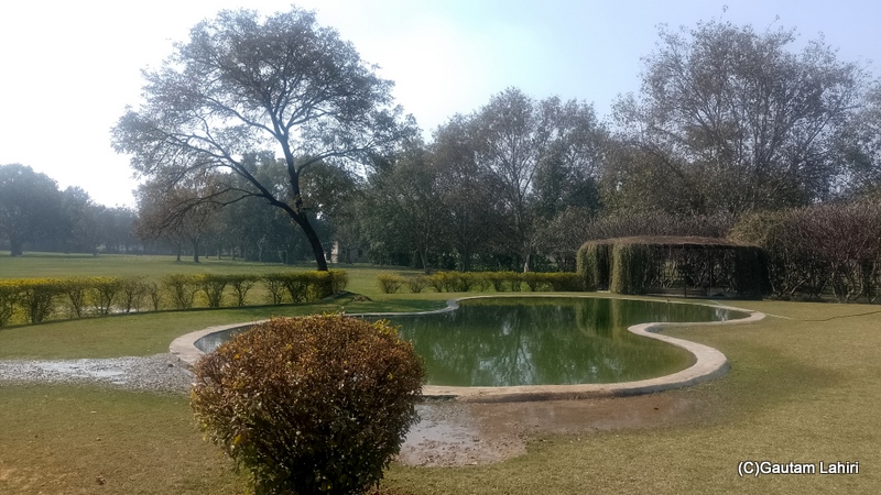 A cemented figure of '8' held the water at bay around the building by gautam lahiri