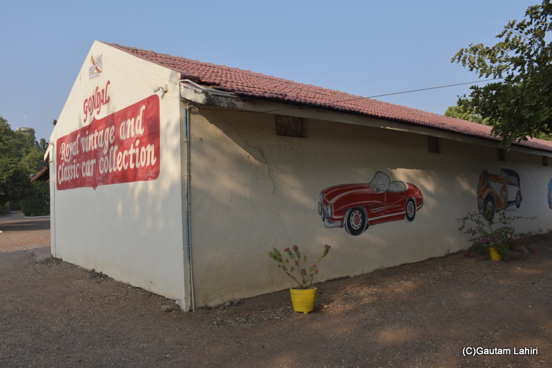 Orange tiled roof, swept across these long buildings housing the cars at Gondal Orchard Palace, Gujarat by gautam lahiri