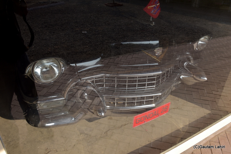 A striking looking 1955 Cadillac Limousine at the Orchard Palace, Gondal, Gujarat by gautam lahiri