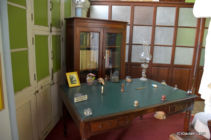 I was captivated by a particular section of the room in Naulakha Palace. It reminded me of my grandfather's house, which had similar period furniture. There was a table with a wide green mat, globular legs, and drawers that echoed the design of the 18th century. A glass cabinet with a hinged top, likely made of Mahogany, built to endure for generations. Indeed, no modern decor can rival the elegance of this craftsmanship by gautam lahiri