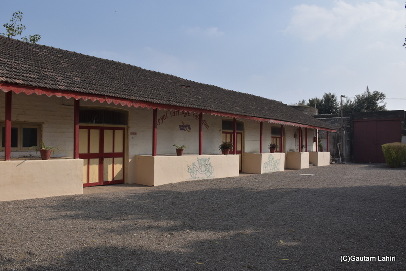 The long corrugated and tiled slanted roof that has the Royal horse drawn carriage collection at Naulakha Palace, Gondal by gautam lahiri