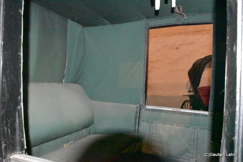 The inside of a Brougham with soft upholstery and padded doors for passenger comfort by gautam lahiri