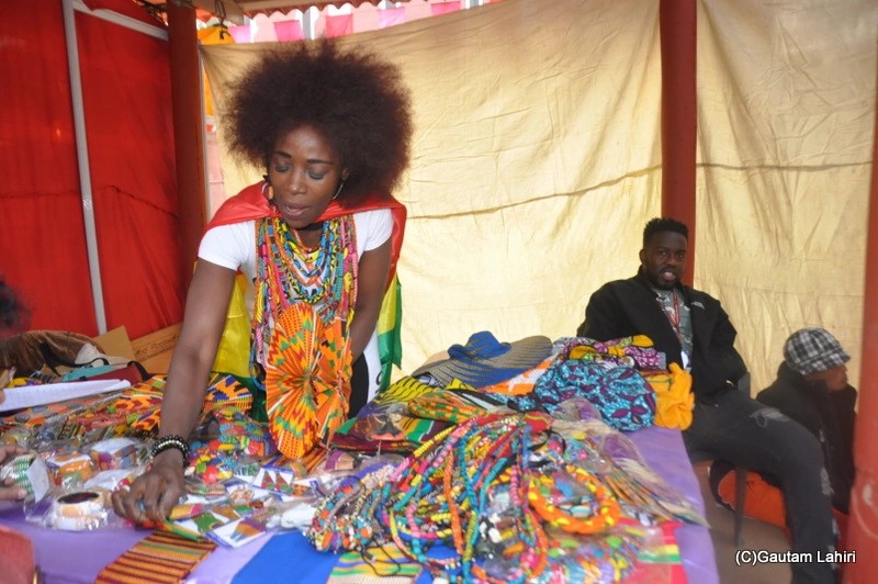 An African stall displaying and selling wooden jewelleries by gautam lahiri