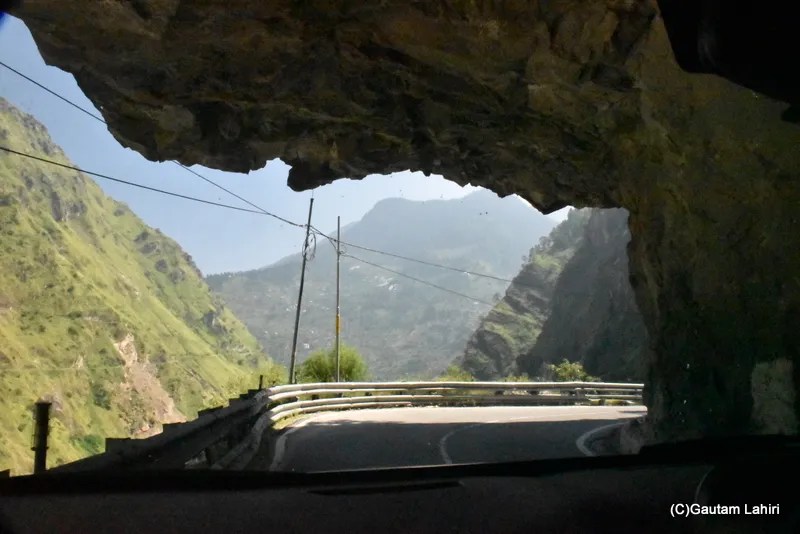 Rock Cave and road near Karchham in Himachal Pradesh by gautam lahiri
